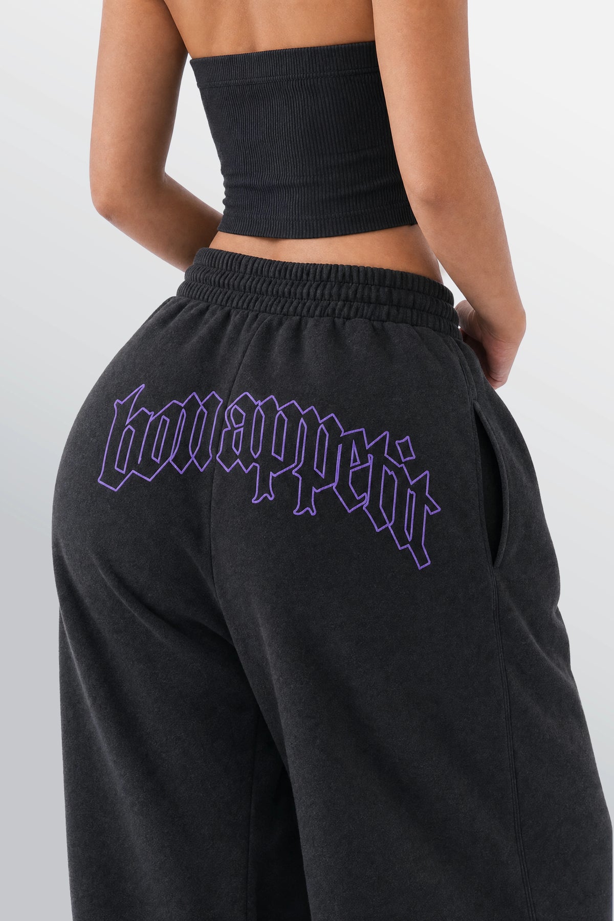 Bon Appetit black loose-fit sweatpants rear artwork on female model